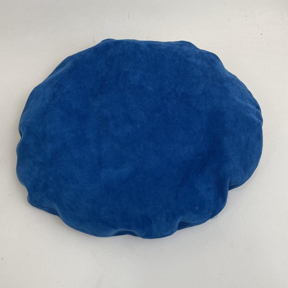 Béret en cuir d'agneau doublé de soie et ré-haussé d'angora